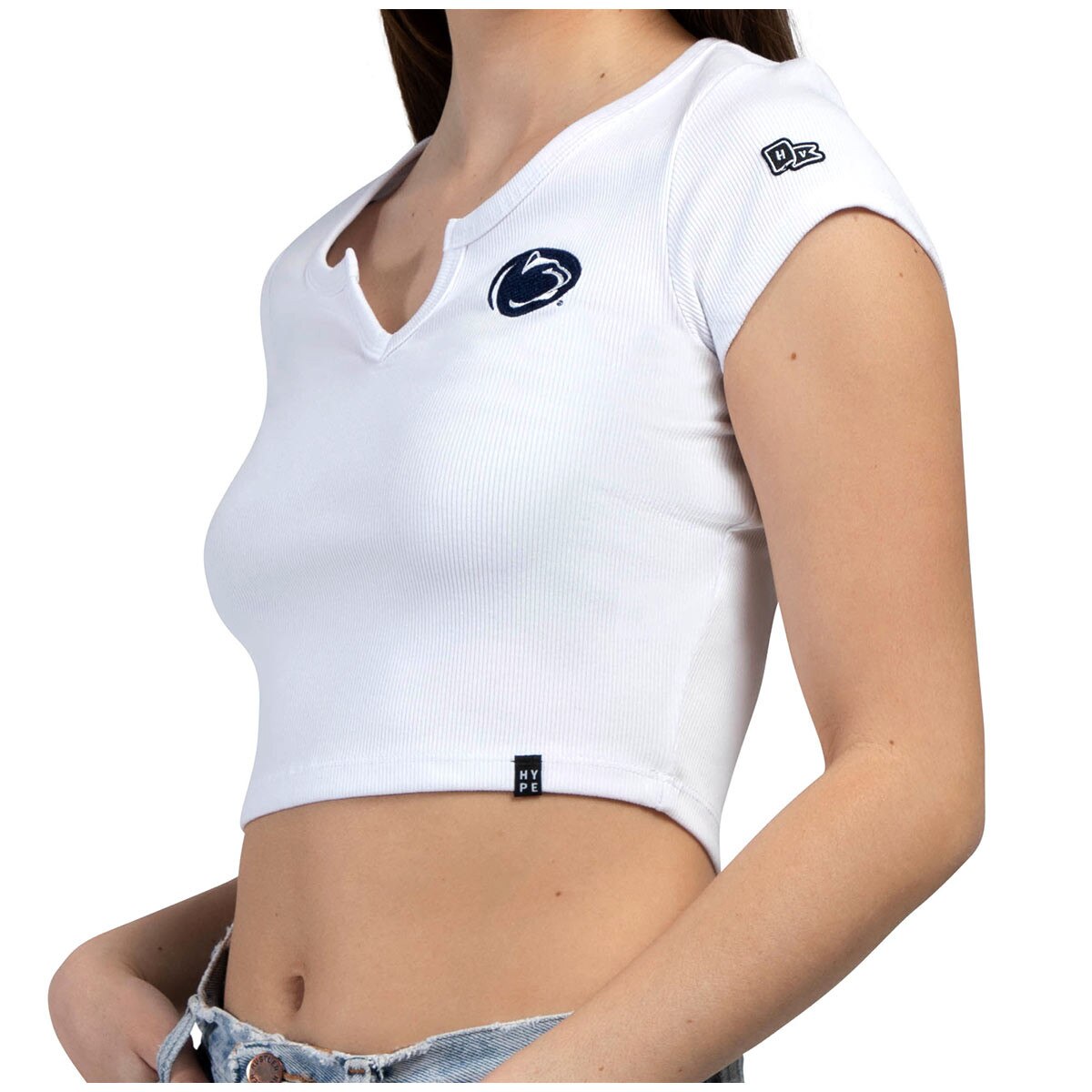 model wearing women's white crop Cali t-shirt with stitched Penn State Athletic Logo
